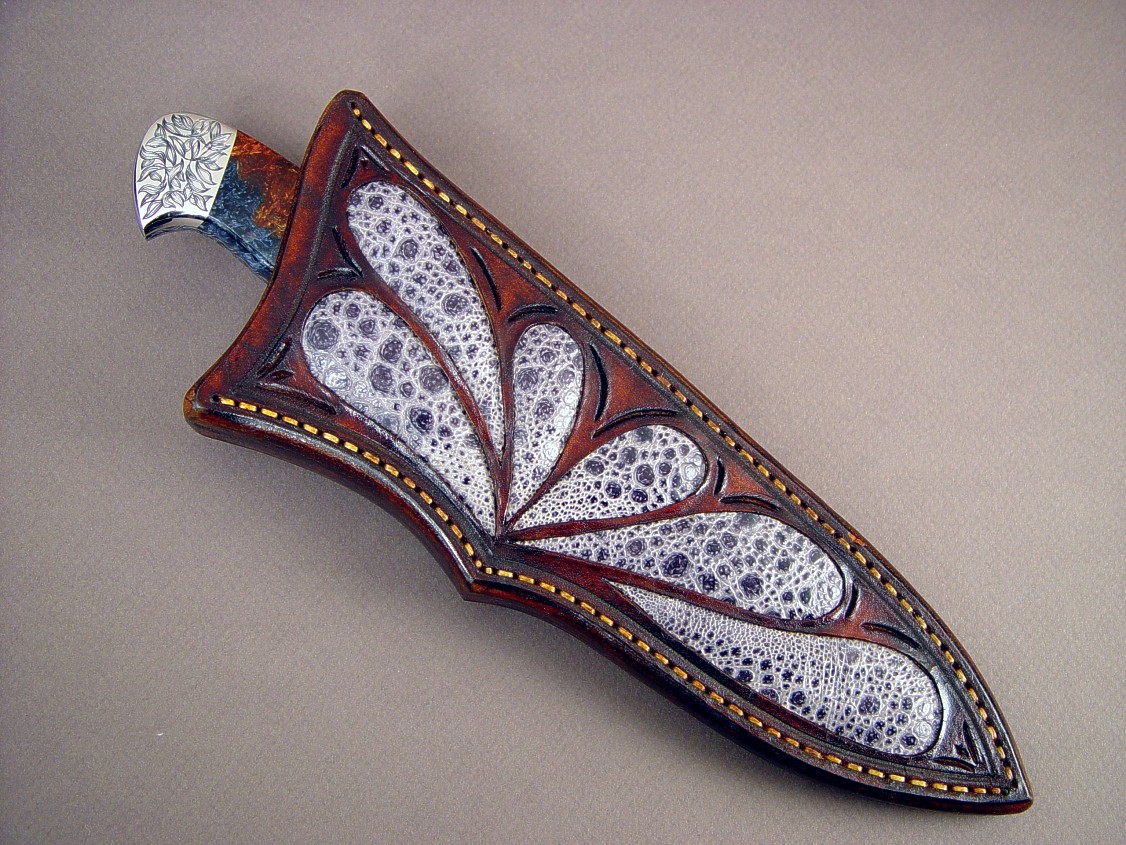 "Altair" obverse side view: CPM154CM stainless steel blade, hand-engraved 304 stainless steel bolsters, Pietersite gemstone handle, Frog skin inlaid in hand-carved leather sheath