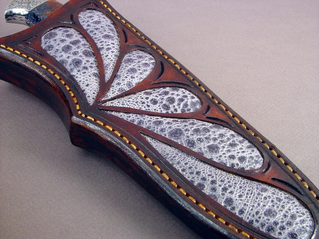 "Altair" in CPM154CM stainless steel blade, hand-engraved 304 stainless steel bolsters, Pietersite gemstone handle, Frog skin inlaid in hand-carved leather sheath