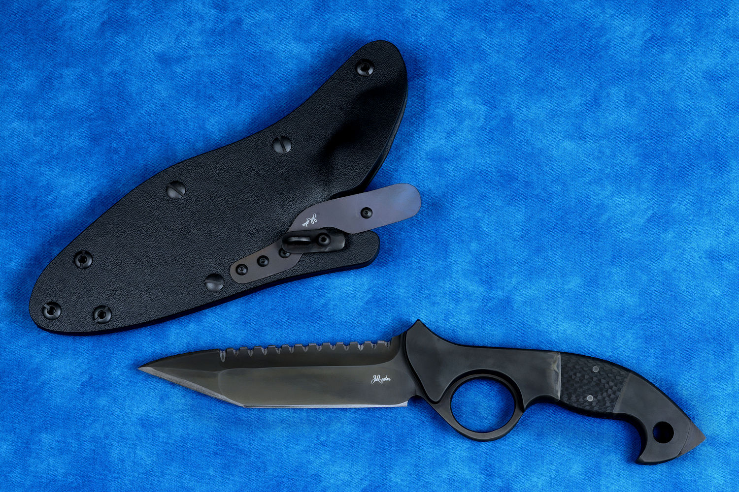 "Ari B'Lilah" counterterrorism, tactical, combat knife, obverse side view in T4 cryogenically treated 440C high chromium martensitic stainless steel blade, 304 stainless steel bolsters, carbon fiber handle, hybrid tension tab locking sheath in kydex, anodized aluminum, anodized titanium, black oxide stainless steel