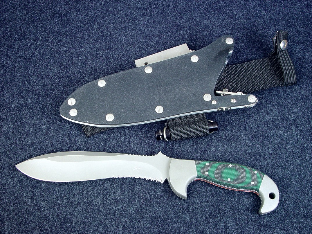 "Hania" obverse side view  in ATS-34 high molybdenum stainless steel blade, 304 stainless steel bolsters, canvas reinforced green, black Micarta phenolic, locking sheath in kydex, aluminum, stainless steel with accessories