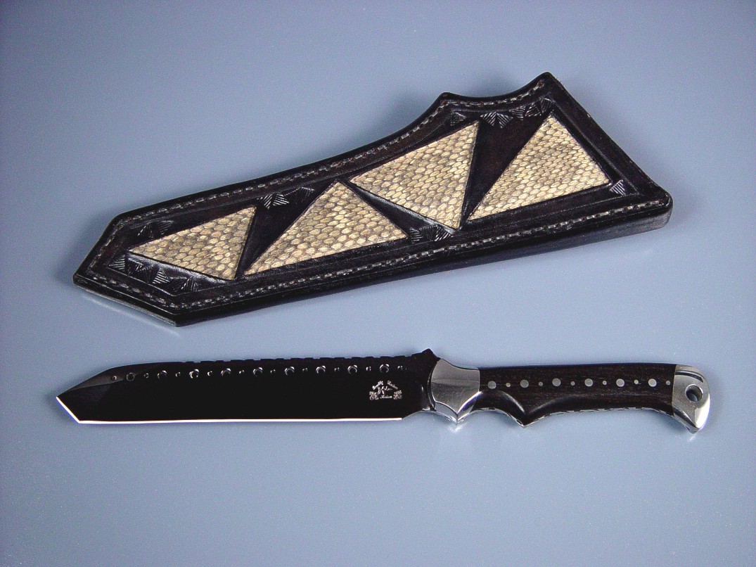 "Trailhead EL" obverse side view in blued O1 high carbon tungsten-vanadium tool steel blade, 304 stainless steel bolsters, Ebony hardwood handle, Prairie Rattlesnake skin inlaid in hand-carved leather sheath