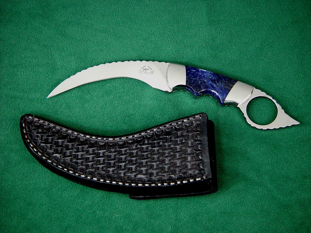 "Wardlow Kerambit" obverse side view in 440C high chromium stainless steel blade, 304 stainless steel bolsters, Sodalite gemstone handle, basketweaved leather sheath