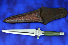 "Daqar" Custom handmade dagger, obverse side view,  in T4 deep cryogenically treated CPM 154CM Powder metal technology martensitic stainless steel blade, hand-engraved, 304 austenitic stainless steel fittings, hand-engraved, nephrite jade gemstone handle, hand-carved leather sheath inlaid with American Bison skin