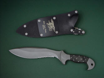 "Horus" obverse side view in ATS-34 high molydenum stainless steel blade, 304 stainless steel bolsters, engraved, Micarta phenolic handle, locking kydex, aluminum, stainless steel sheath with black lacquered brass engraved flashplate.