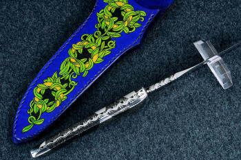 "Patriot" spine edgework, filework view in CPM154CM high molybdenum powder metal technology martensitic stainless steel blade, hand-engraved 304 stainless steel bolsters, Golden Midnight Agate gemstone handle, laser carved,  hand-dyed leather sheath