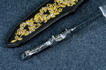 "Patriot" inside spine edgework, filework view in CPM154CM high molybdenum powder metal technology martensitic stainless steel blade, hand-engraved 304 stainless steel bolsters, Golden Midnight Agate gemstone handle, laser carved,  hand-dyed leather sheath