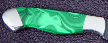 Finished Malachite gemstone on knife handle