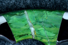 Verdite, 6 power enlargement, is a rock,  not a mineral, also called Budstone and comes from South Africa