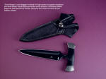 "Grim Reaper" push dagger, obverse side view in blued O1 high carbon tungsten-vanadium tool steel blade, hand-engraved nickel silver bolsters, Australian Black Jade gemstone handle, stingray inlaid in hand-carved leather sheath